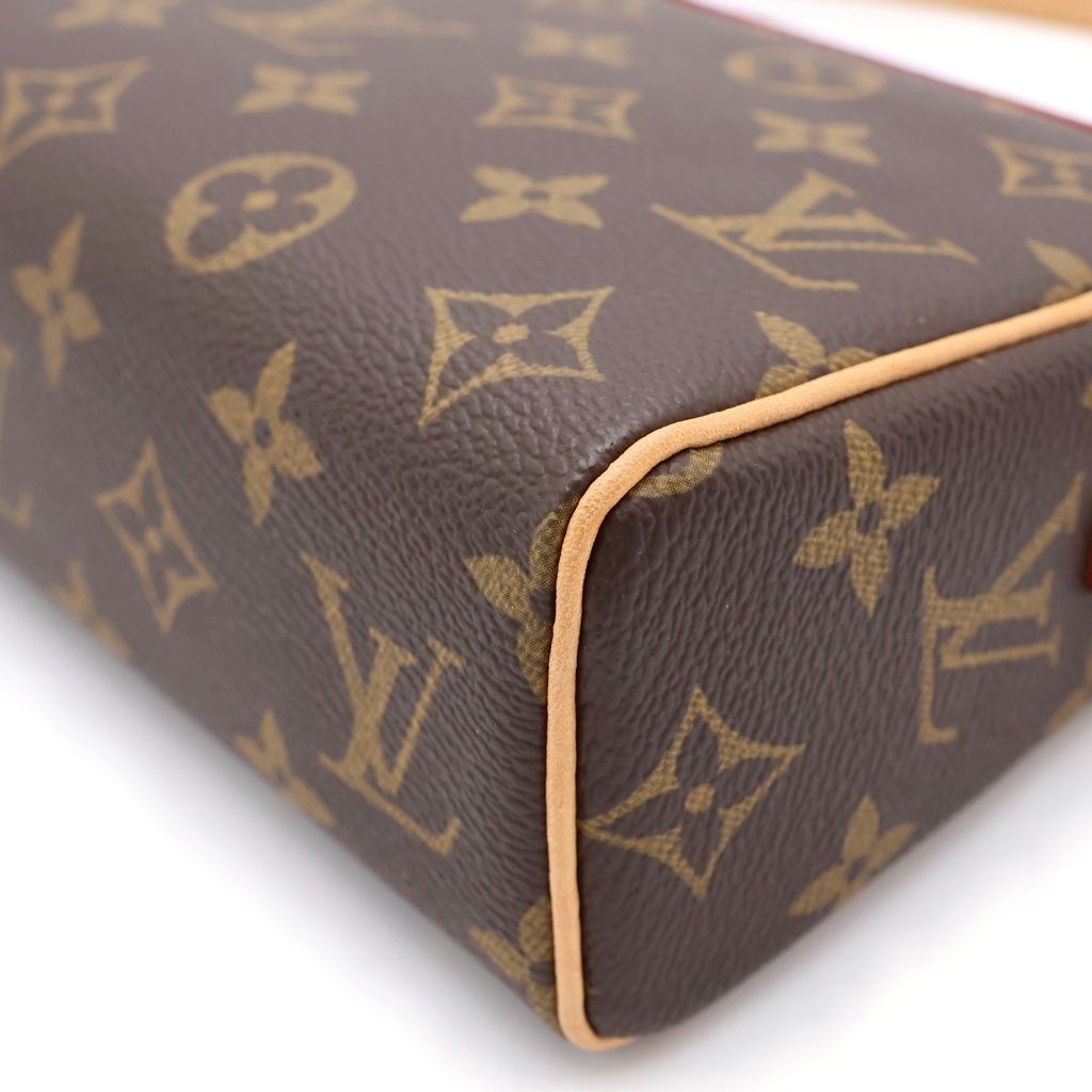 ルイヴィトンモノグラムデザインのブラウンレザーハンドバッグ。 LOUIS VUITTON (ルイヴィトン) モノグラム レシタル PVC レザー