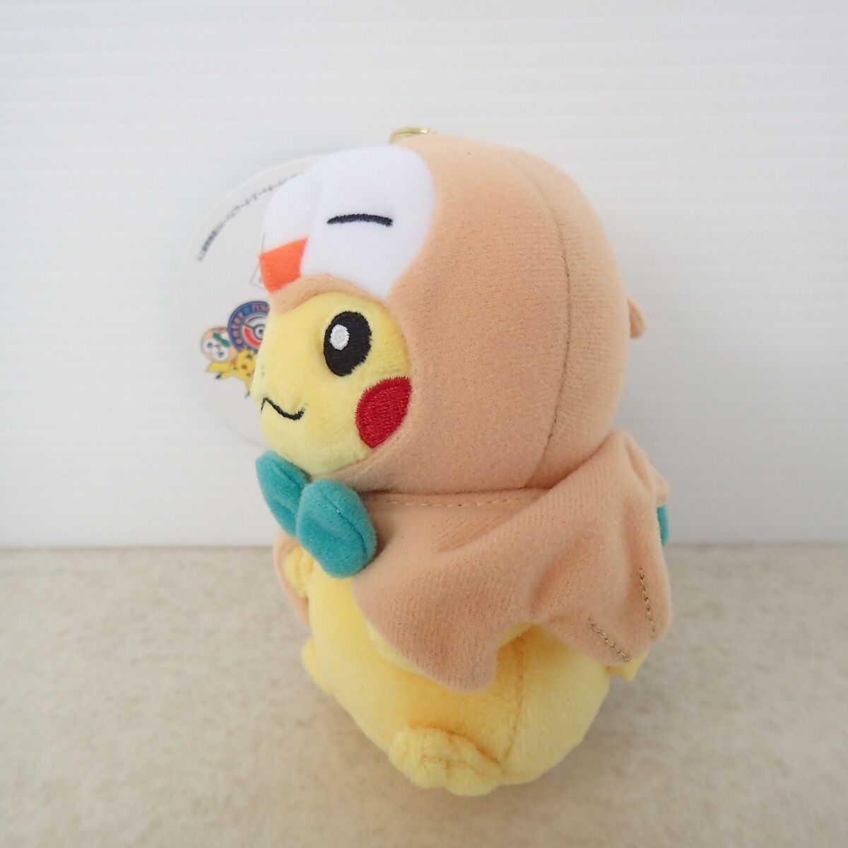 ポケモンセンター マスコット モクローのポンチョを着たピカチュウ 紙