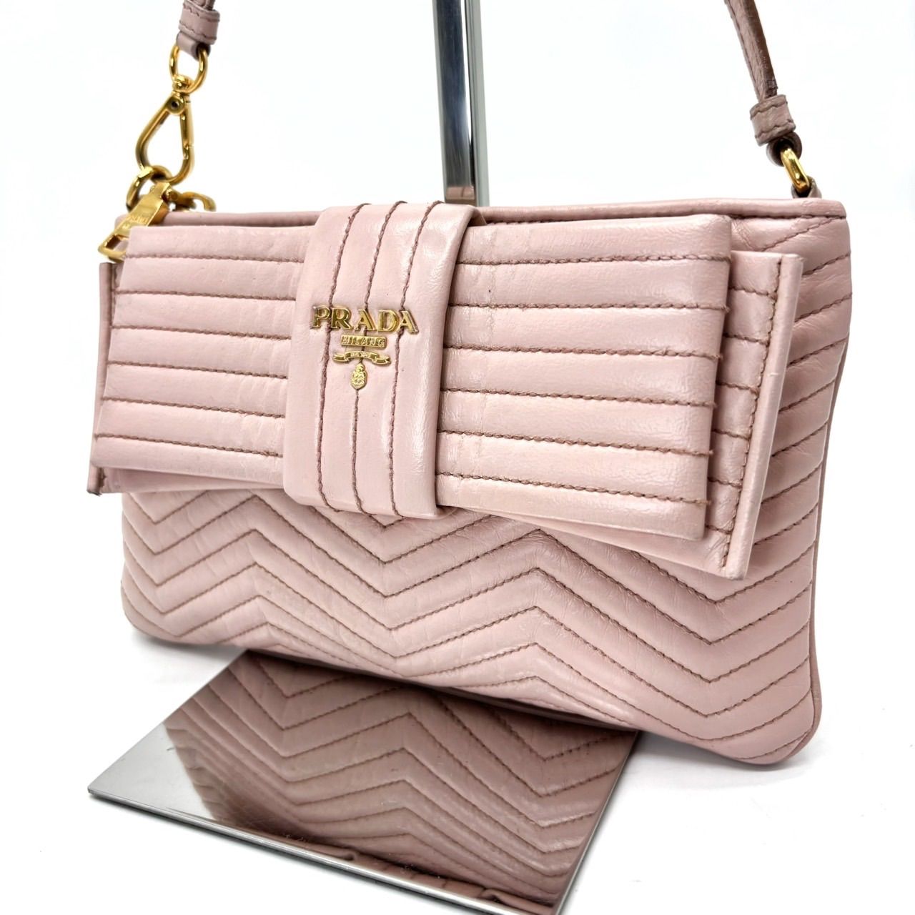 【良品】PRADA プラダ ダイアグラム リボン ハンドバッグ アクセサリーポーチ レザー 革 ゴールド金具 ピンク レディース