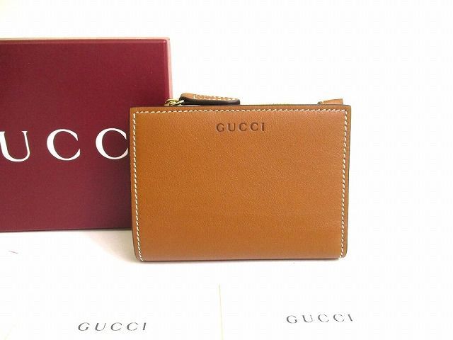グッチ GUCCI GGエンブレム レザー ミディアムウォレット 2つ折り 財布 コンパクトウォレット メンズ レディース 【未使用保管品】