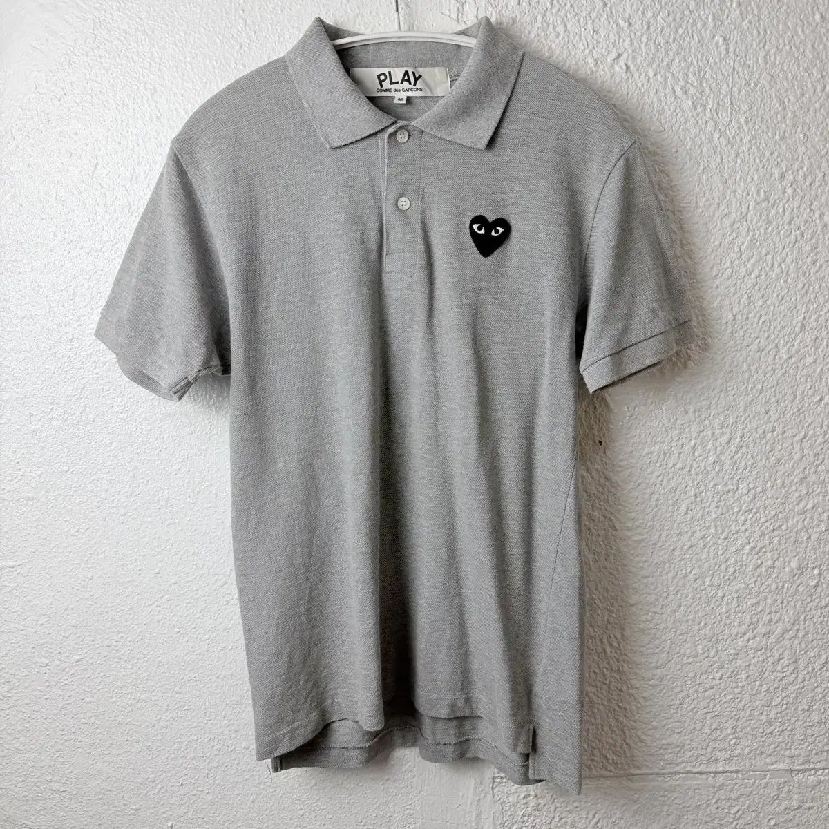 COMME des GARCONS コム・デ・ギャルソン ブラックワッペン ポロ KARA（カラ） 半袖Tシャツ グレー
