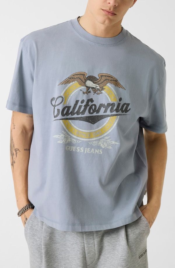 ゲス メンズ トップス Tシャツ グラフィック GUESS California Graphic TShirt BLUE CURRENTS MULTI ブルー