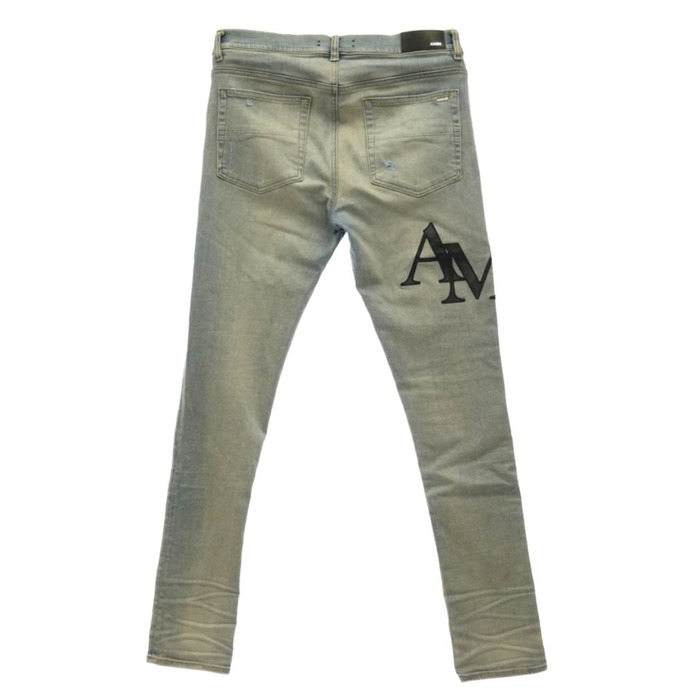 AMIRI アミリ 26SS AMDNSY1114 Staggered Logo Skinny Jean レザーロゴパッチ ダメージ加工 スキニー デニムパンツ ライトブルー系 UK 33【中古】 AMIRI アミリ 26SS AMDNSY1114 Staggered Logo Skinny Jean レザー