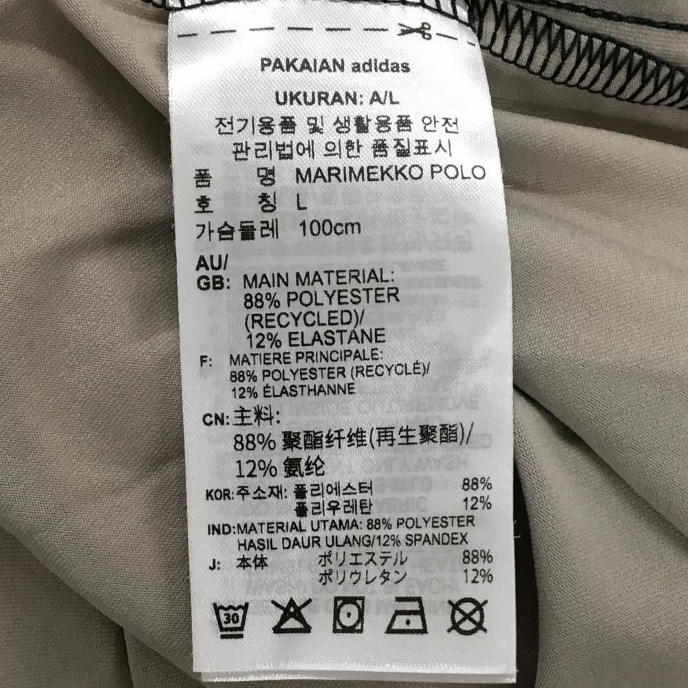 超美品】アディダス×マリメッコ 半袖ポロシャツ 黒×ベージュ 総柄