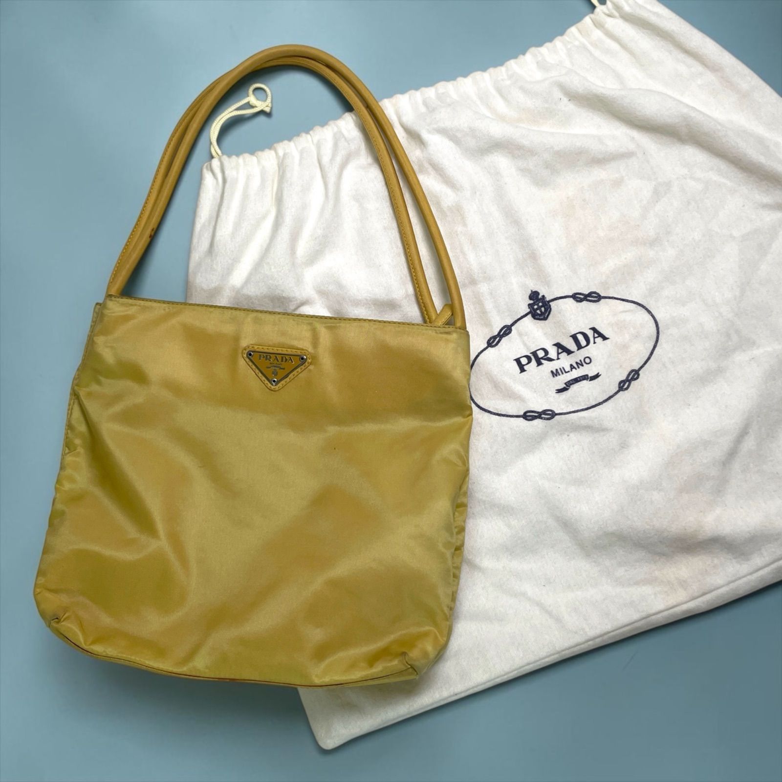 逸品】PRADA プラダ ショルダーバッグ イエロー ナイロン - メルカリ