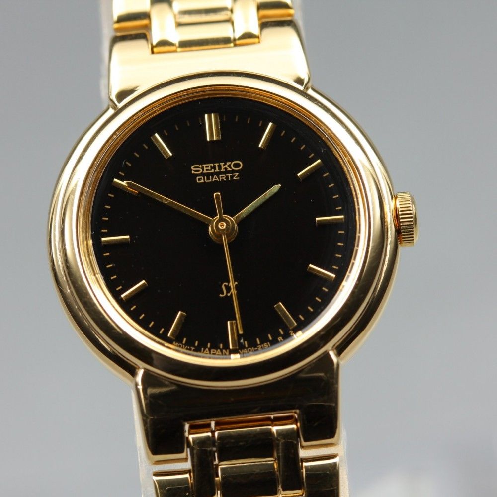⭐︎定価70000円以上　電池交換済み⭐︎SWAROVSKI ゴールド クォーツ時計 稼働品】 SEIKO SX V401-0671 ブラック ゴールド 純正ブレス クオーツ