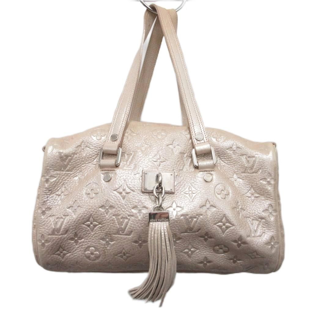 ルイヴィトン LOUIS VUITTON モノグラムシマー コメト M95818 ハンドバッグ トートバッグ メタリック タッセル 総柄 ライトピンク ☆AA★ 58,355円