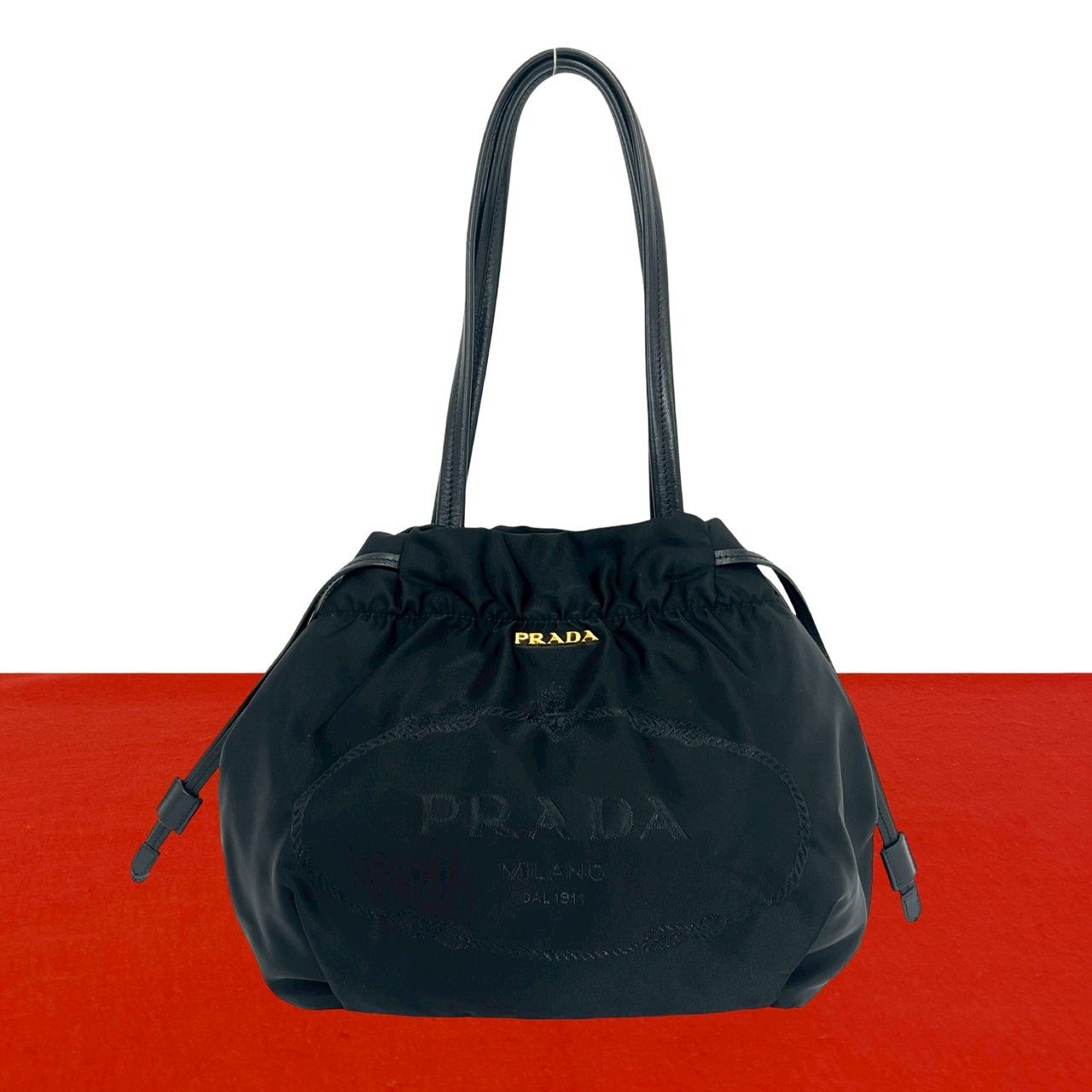 【極上美品・使用感少ない✨】プラダ トートバッグ 巾着 バケツ型 肩掛け 黒 ほぼ未使用 希少品 PRADA プラダ ロゴ 金具 ナイロン レザー 本革 巾着
