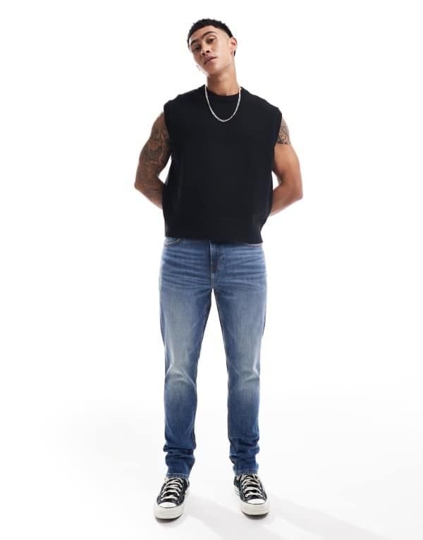 エイソス メンズ ボトムス デニムパンツ ジーンズ ASOS DESIGN skinny jeans in mid wash Mid wash blue ブルー
