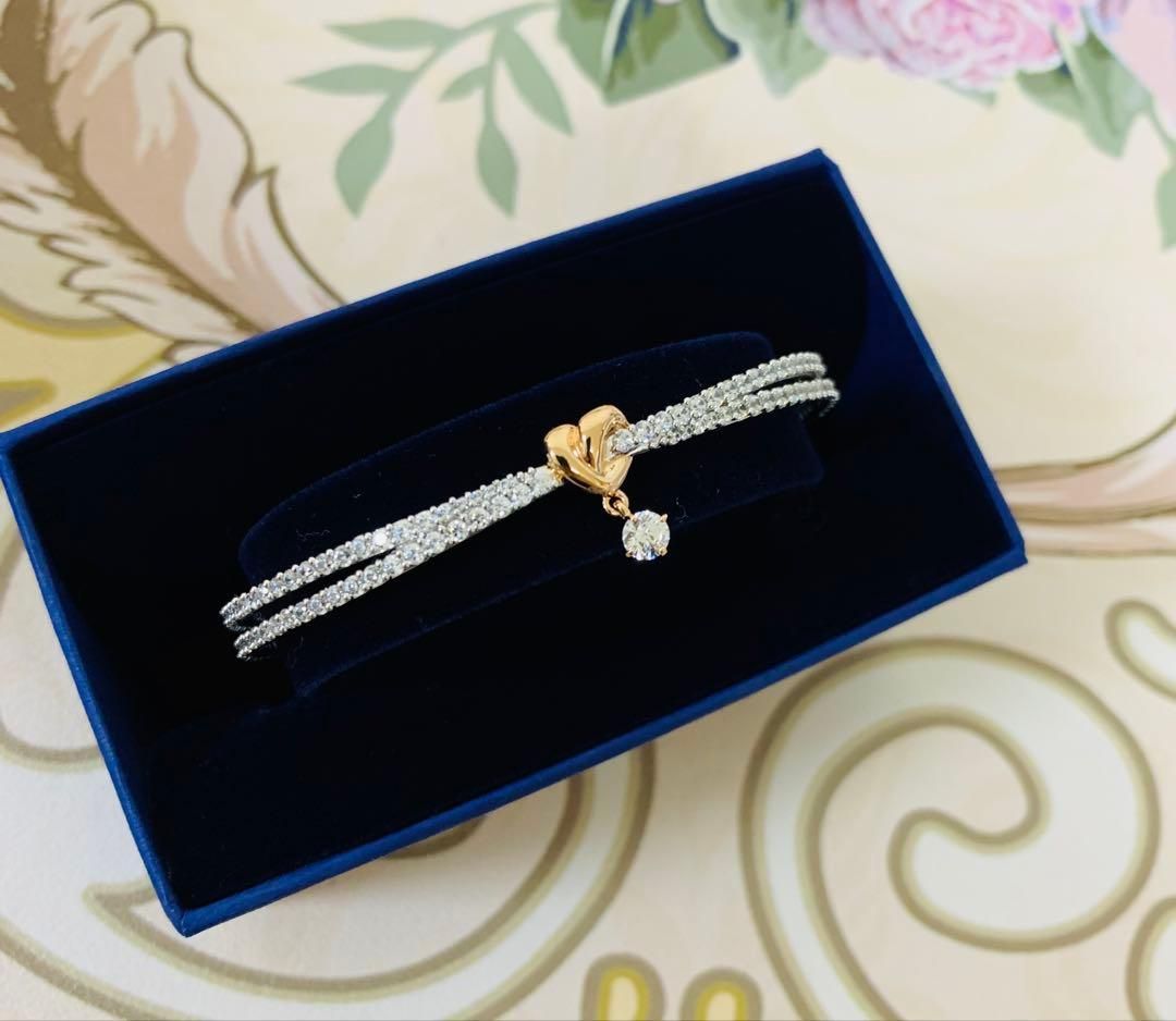 新品 スワロフスキーSwarovski Lifelong Heart バングル - メルカリ