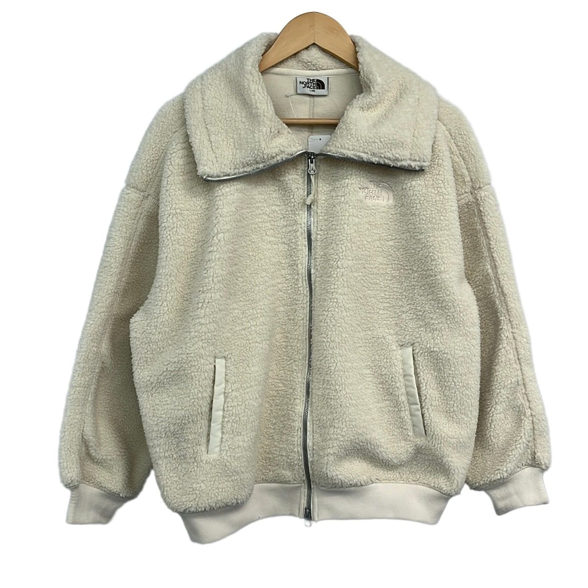 THE NORTH FACE(ノースフェイス) ブルゾン サイズL/95 レディース - アイボリー 長袖/フリース/ジップアップ/冬