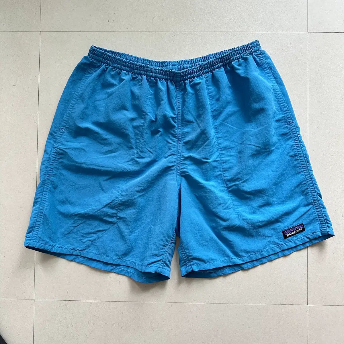 L/7インチ patagonia(パタゴニア) バギーズ ハーフパンツ ラディウスブルー RAD