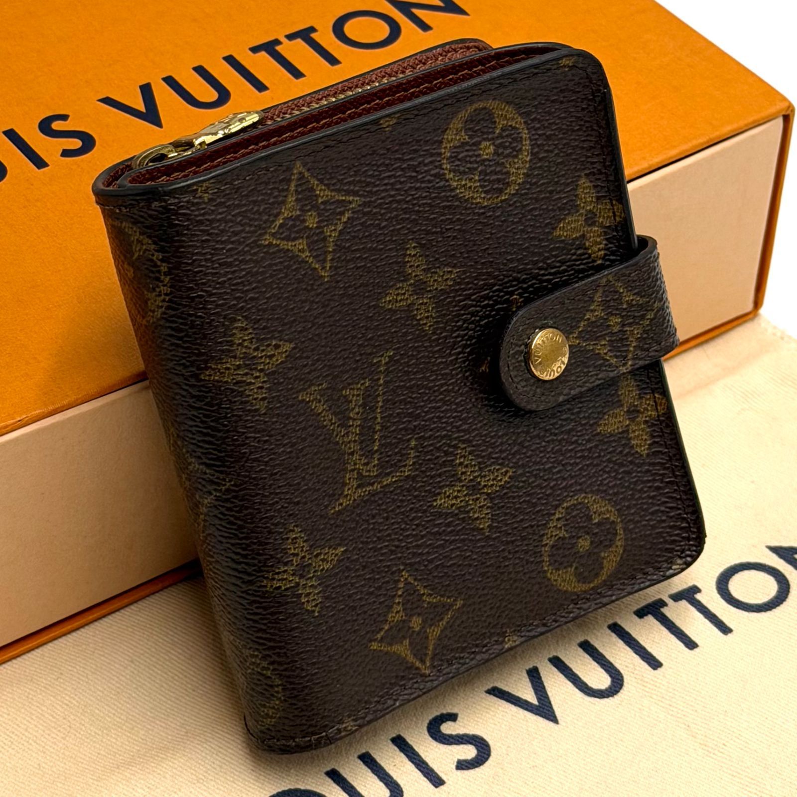 ルイヴィトン LOUIS VUITTON モノグラム コンパクトジップ 二つ折り財布 コンパクト ラウンドファスナー お札入れ 男女兼用 ブラウン ゴールド金具 レザー 12,375円