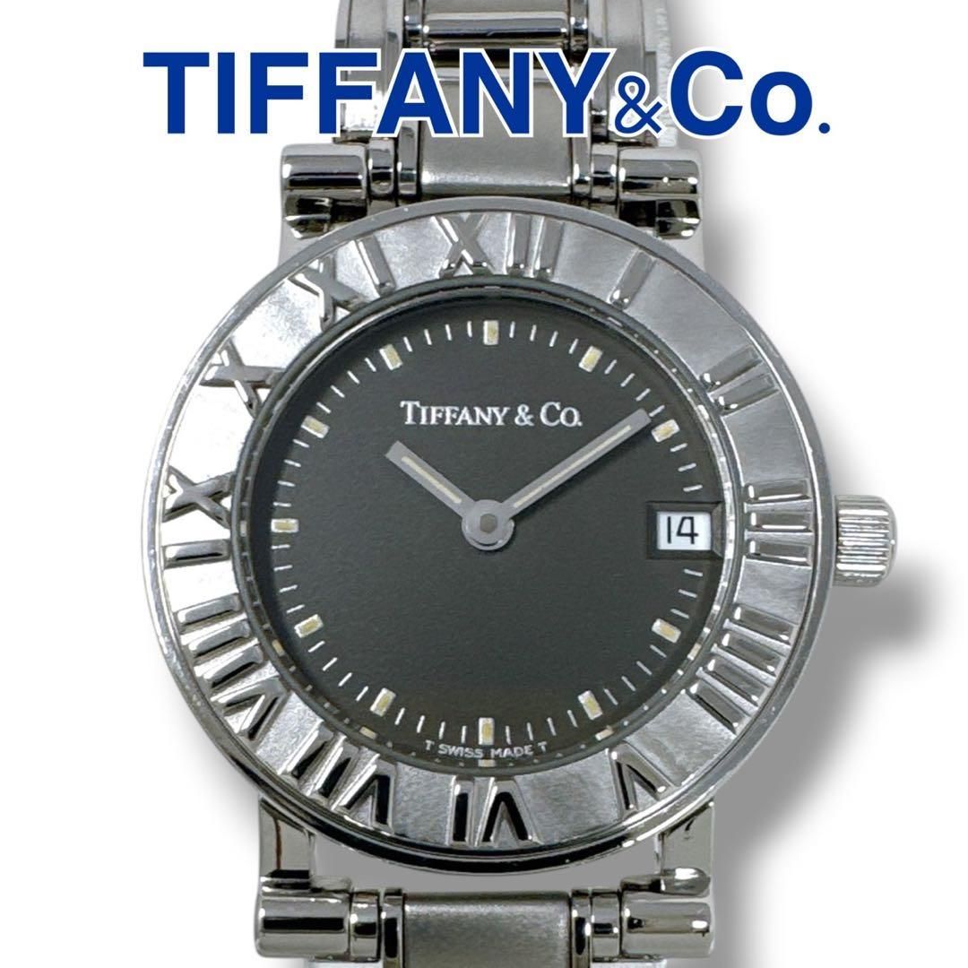 ティファニー アトラス ラウンド クォーツ ブラック デイト レディース 腕時計 TIFFANY ブランド 美品 稼働 ライトブラック文字盤 シルバー クオーツ ステンレススチール スイス製 定価259,200円 SA/未使用に近い