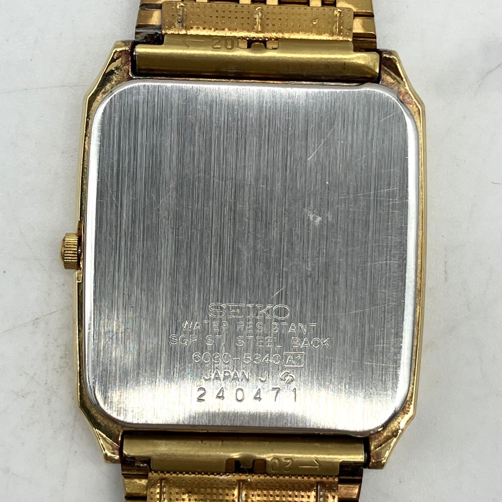 HDN663【お買い得】SEIKO 腕時計 スクエア型ケース ゴールドカラー