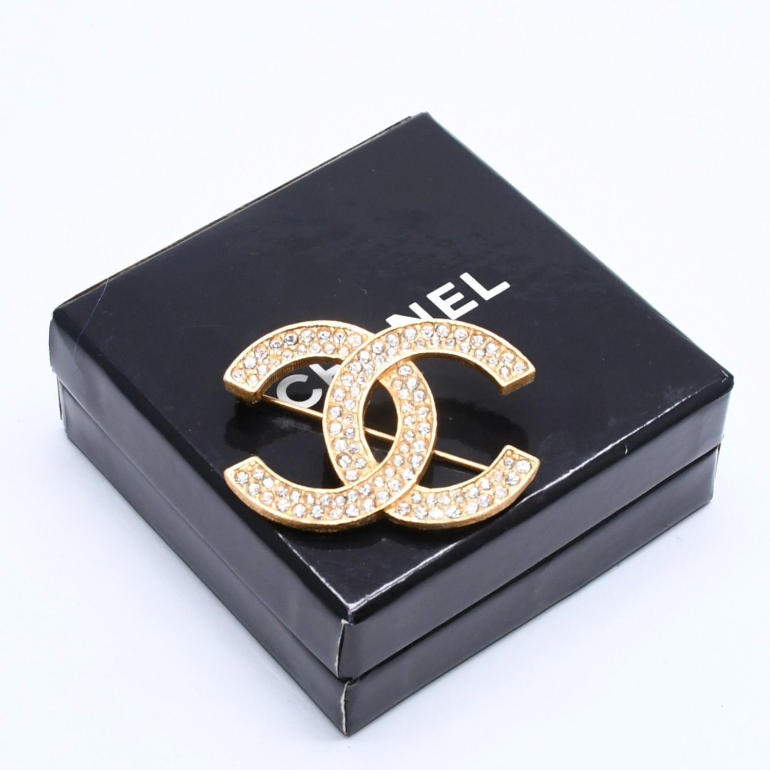 極美品 CHANEL シャネル ブローチ ラインストーン ココマーク 9.9g GP ラインストーン ゴールド金具 中古 4a005144 42,900円
