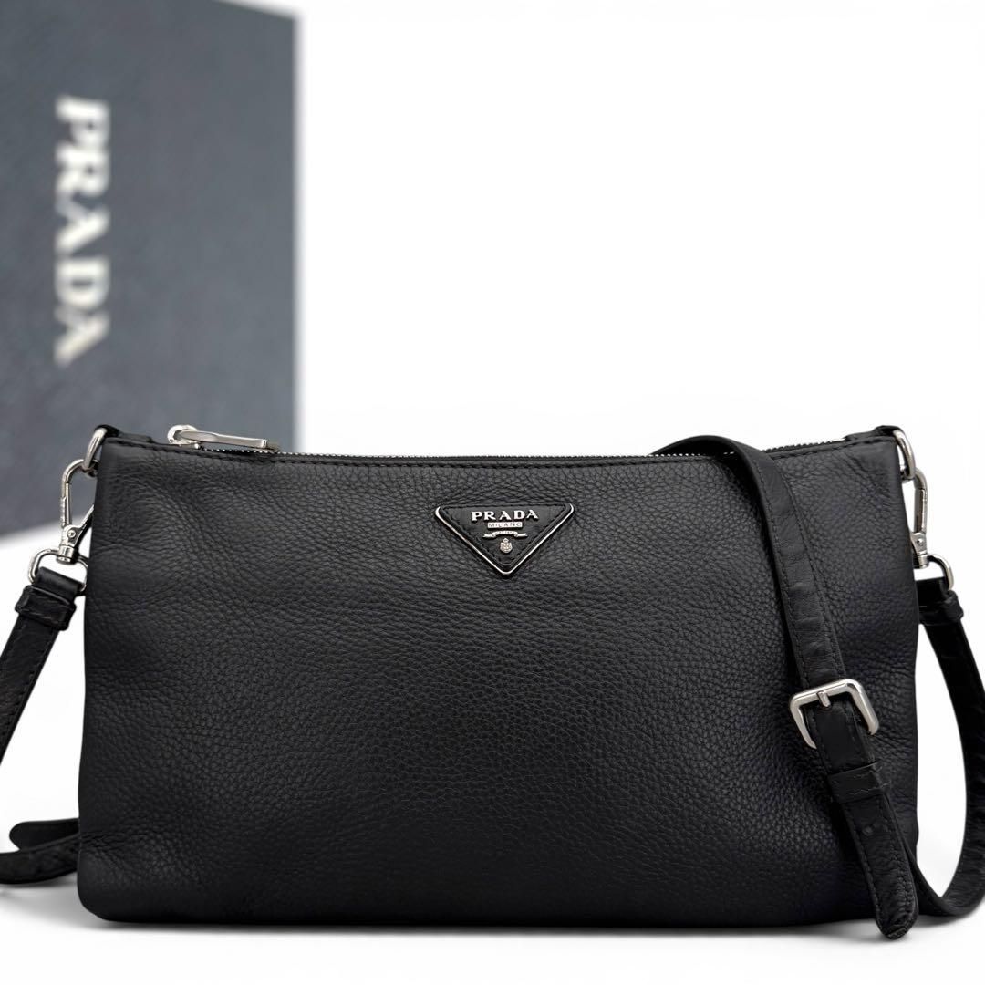 PRADA　BT0997　ショルダーバッグ　ヴィッテロダイノ　バッグ ショルダーバッグ　ヴィッテロ　ダイノ　レザー　ブラック　黒　レディース 三角ロゴ　サコッシュ　カメラバッグ　レザー 51,000円