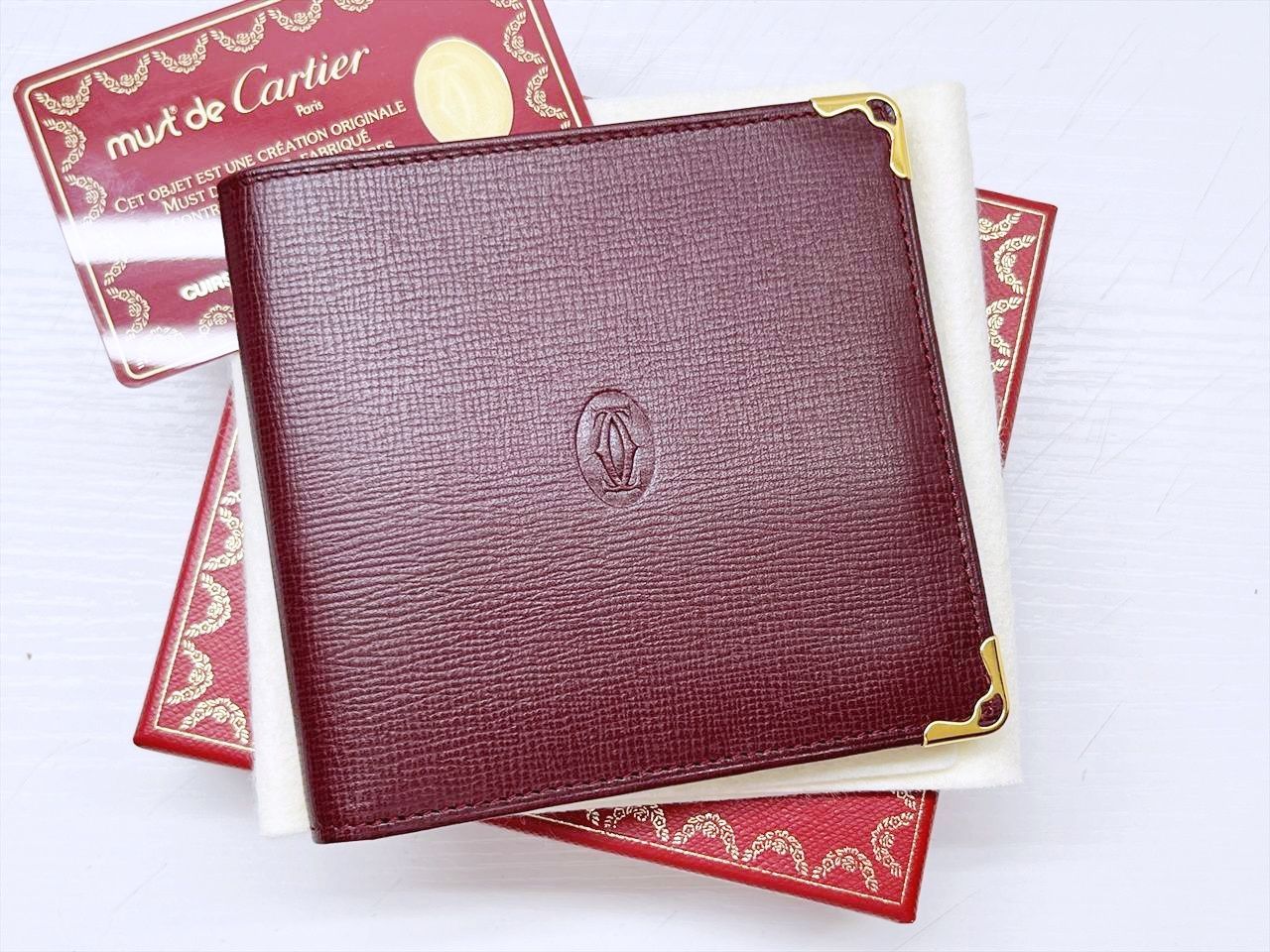 美品　Cartier　カルティエ　マスト　二つ折り財布　札入れ　小銭入れなし　ボルドー　ゴールド　L3000166 18,000円