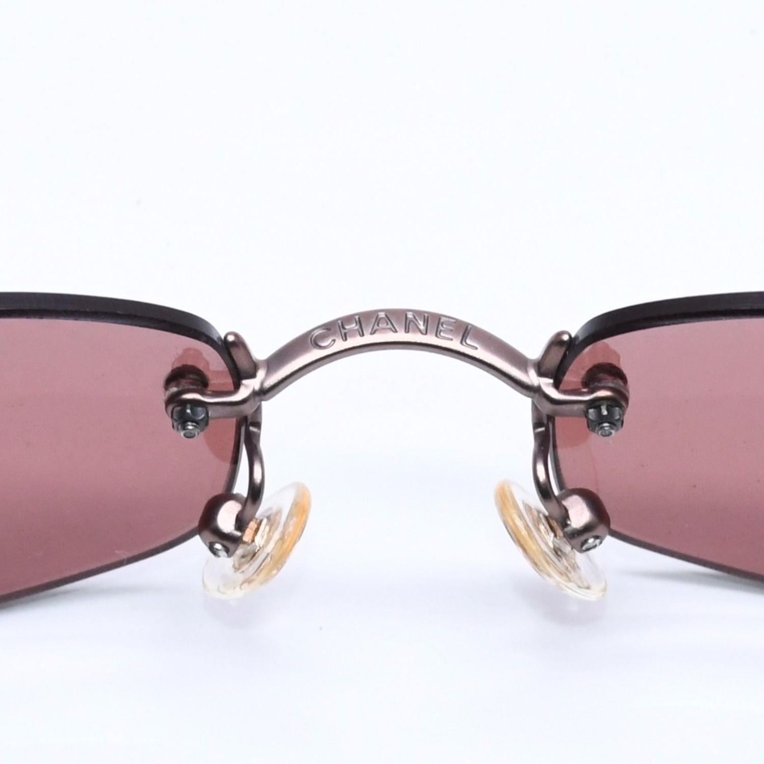 CHANEL シャネル リムレス サングラス サイドココマーク ブロンズ パープル イタリア製 メタル サイズ54◻︎19 美品 中古 4a005423 CHANEL シャネル リムレス サングラス サイドココマーク ブロンズ