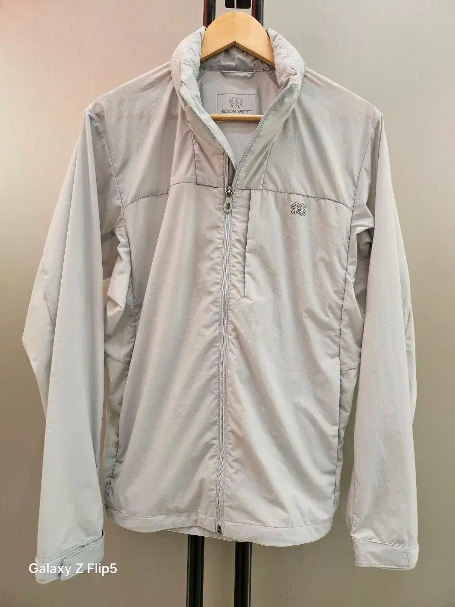 KOLON SPORT 24SS フード取り外し軽量ウィンドブレーカー ジャケット 95 ライトグレー