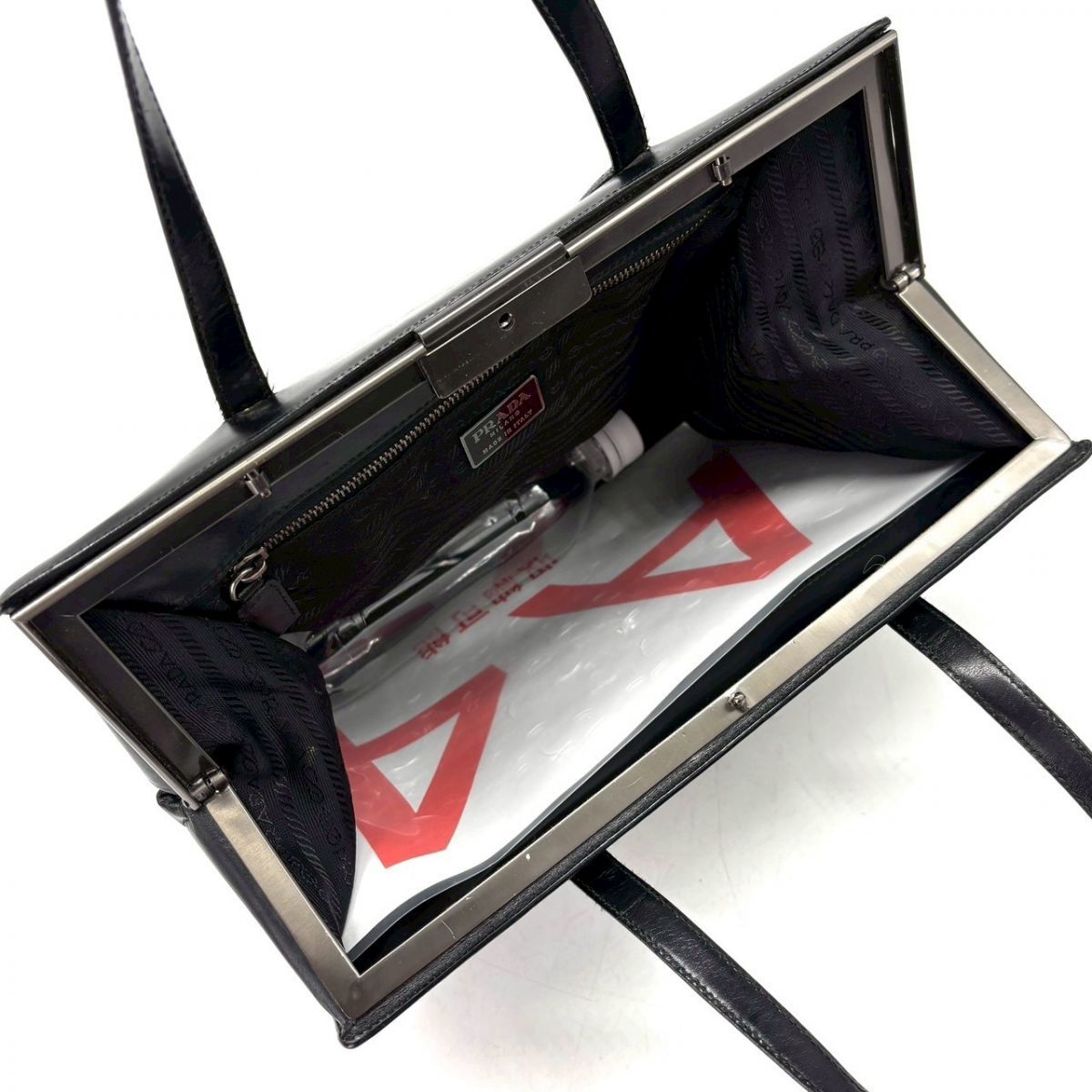 凛とした佇まいが魅せる】 PRADA トートバッグ レザー がま口 ビジネス