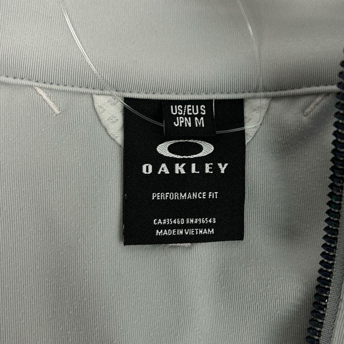 OAKLEY(オークリー) ブルゾン サイズM メンズ美品 - グレー×ライト
