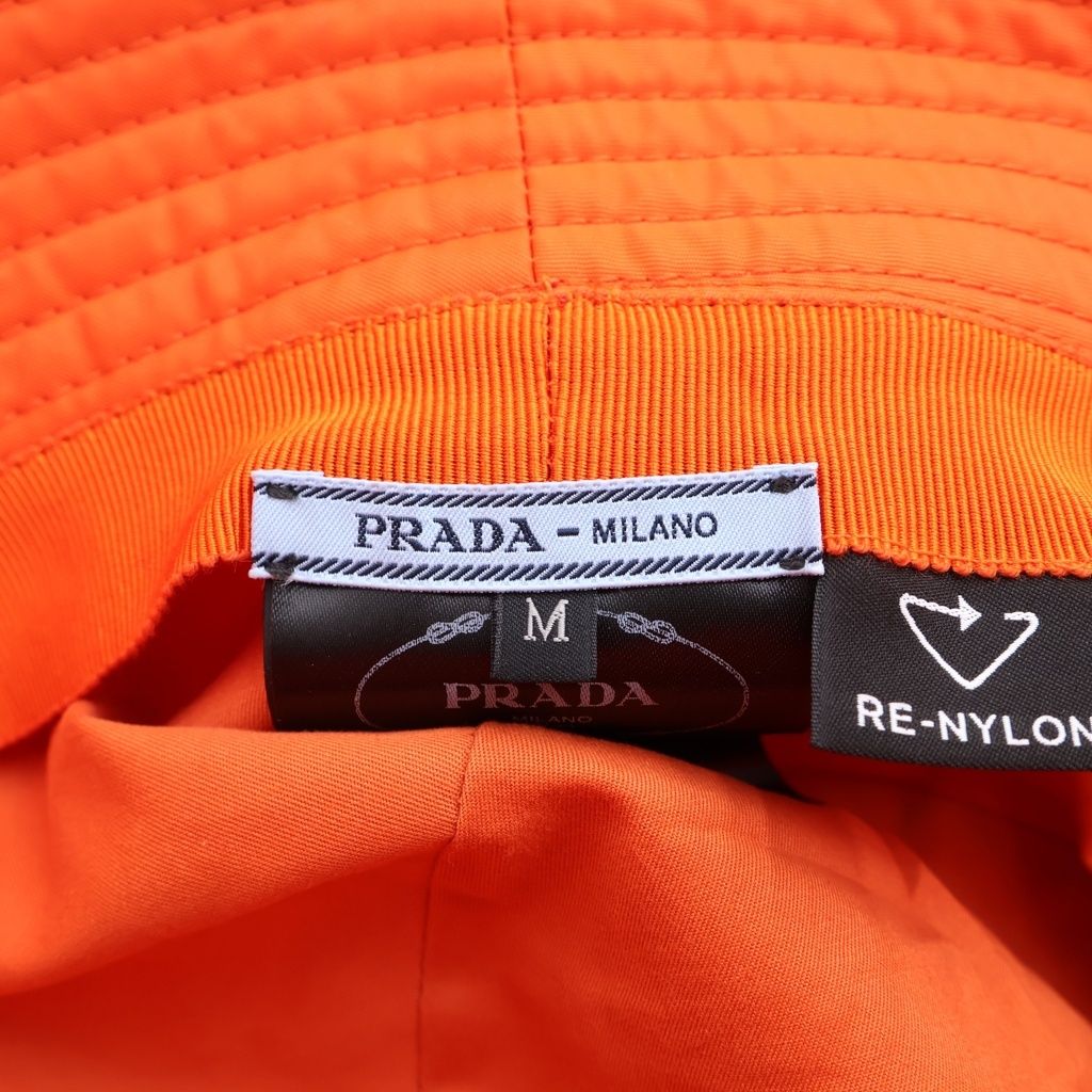 PRADA (プラダ) ロゴ三角プレート バケットハット 帽子 オレンジ