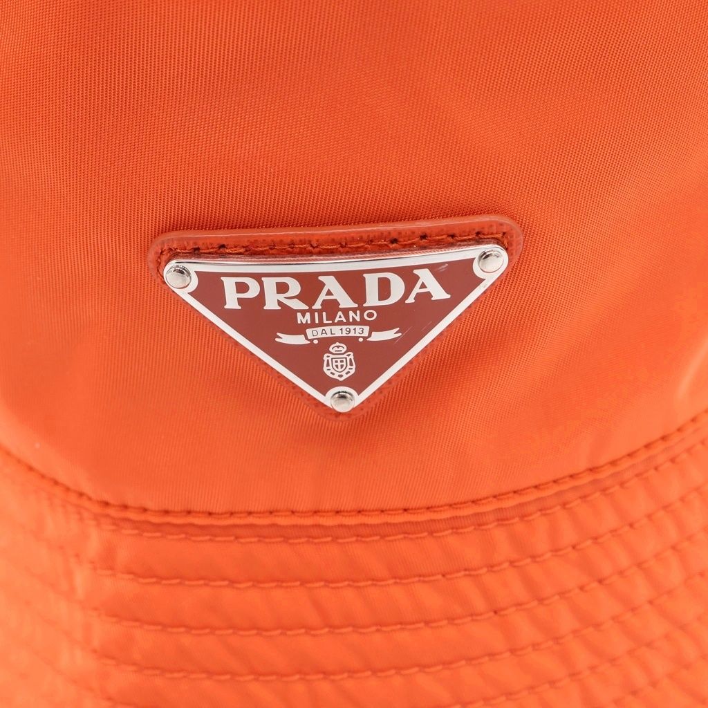 PRADA (プラダ) ロゴ三角プレート バケットハット 帽子 オレンジ