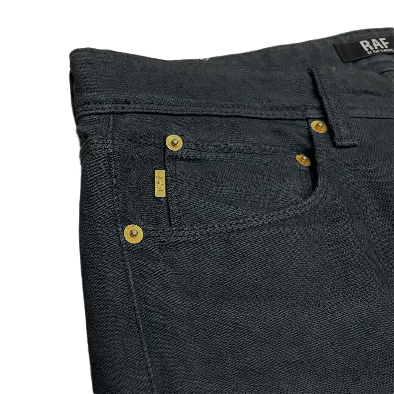 RAF by RAF SIMONS ネイビーデニム5ポケットテーパードパンツ ジーンズ