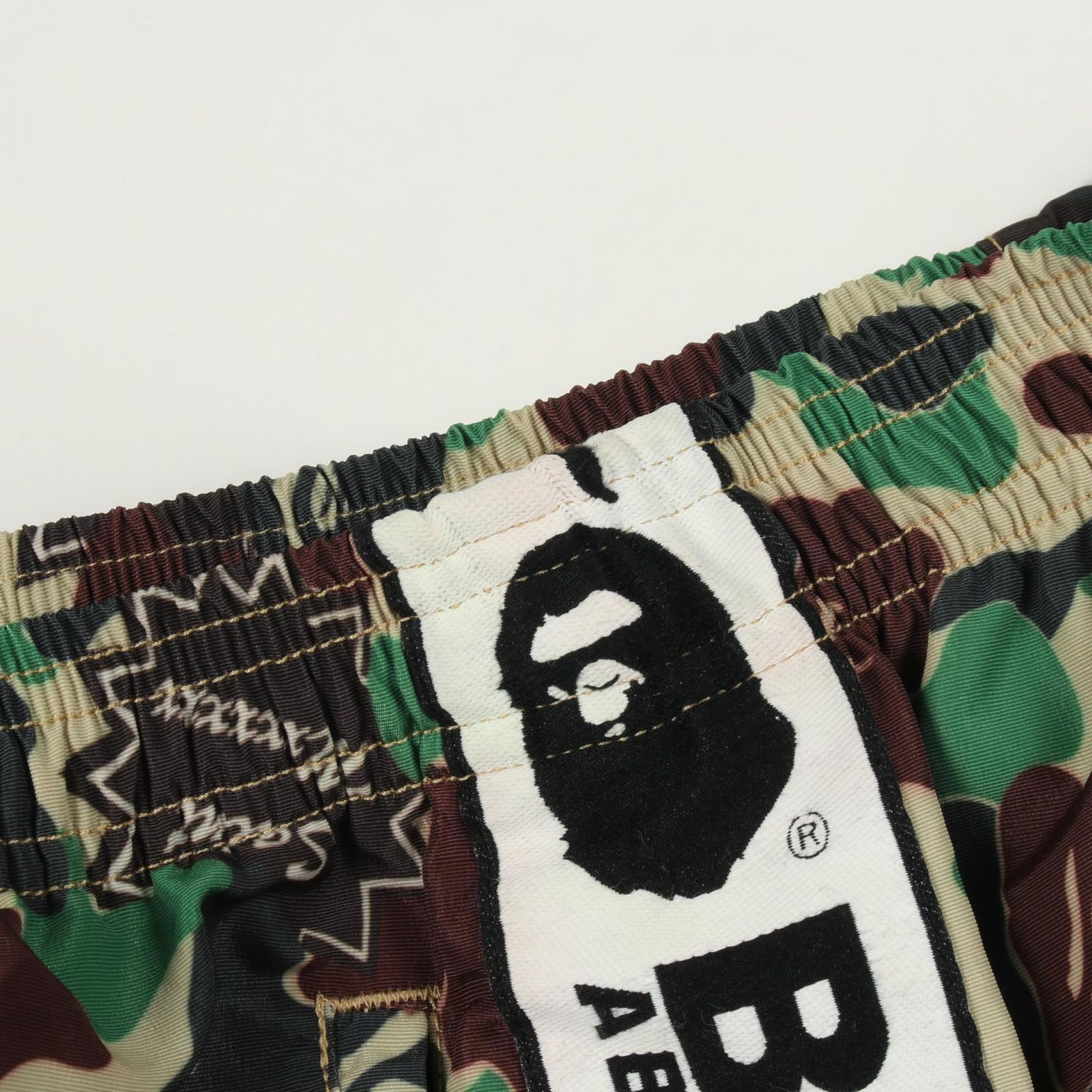 アベイシングエイプ A BATHING APE パンツ SAINT MICHAEL × A BATHING