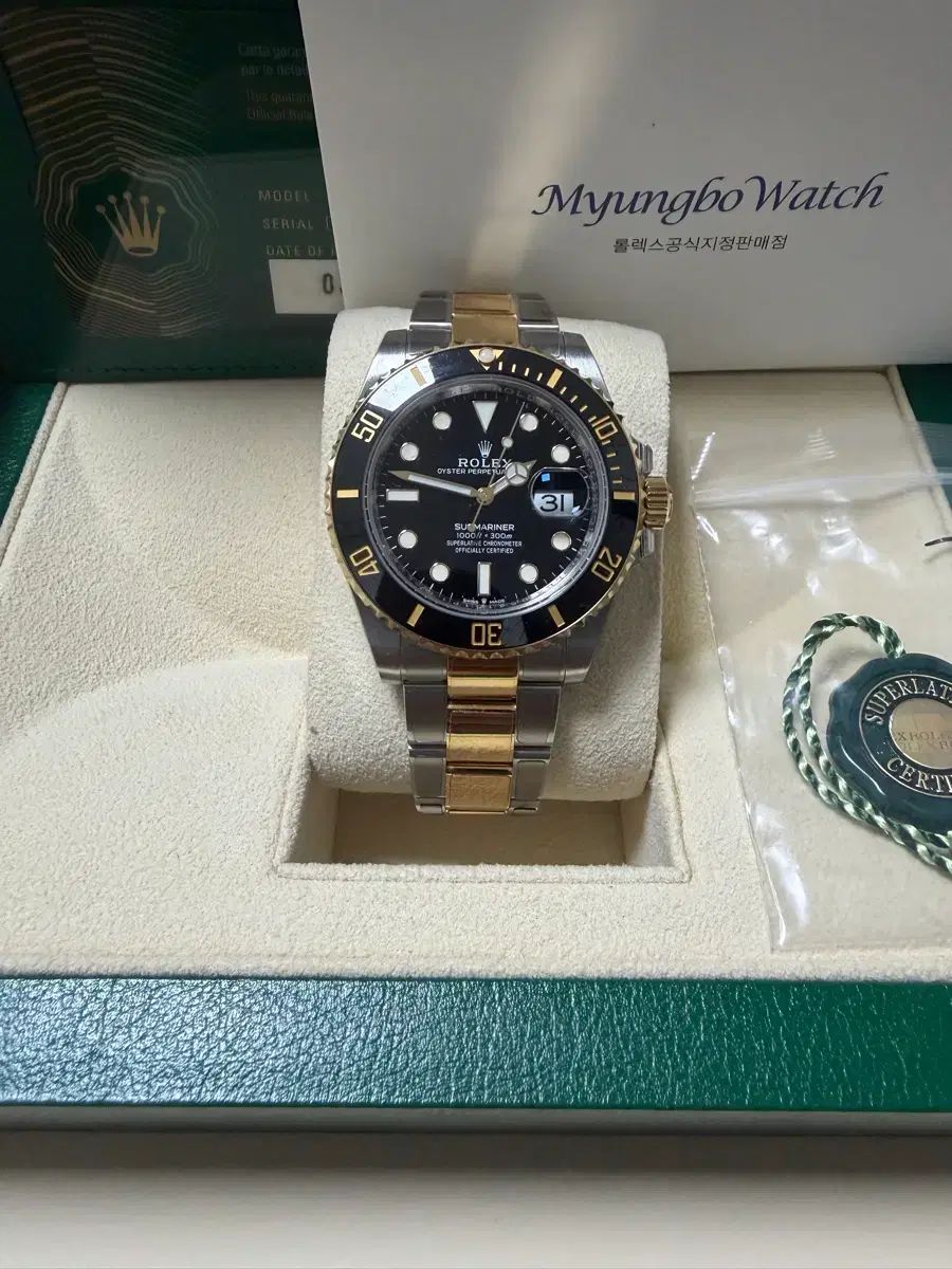 ROLEX サブマリーナー 黒コンビ