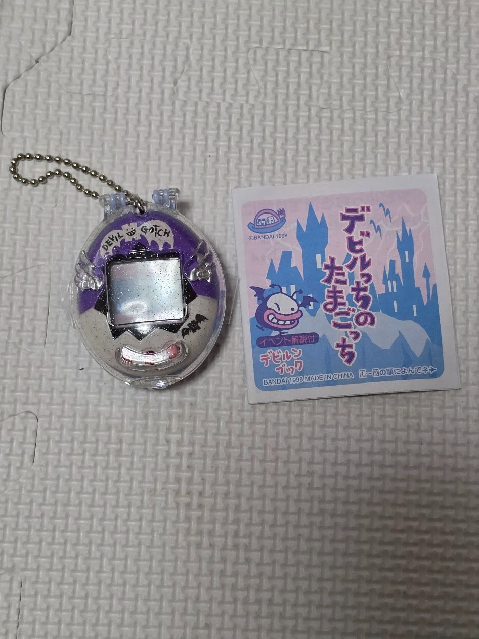 Good Condition Devil's Tamagotchi Translated Item with Case