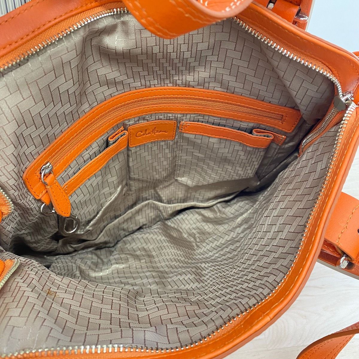 極美品 COLE HAAN コールハーン ハンドバッグ/トートバッグ オレンジ レザー ギャザーデザイン シルバー金具 レディース[OA05386]