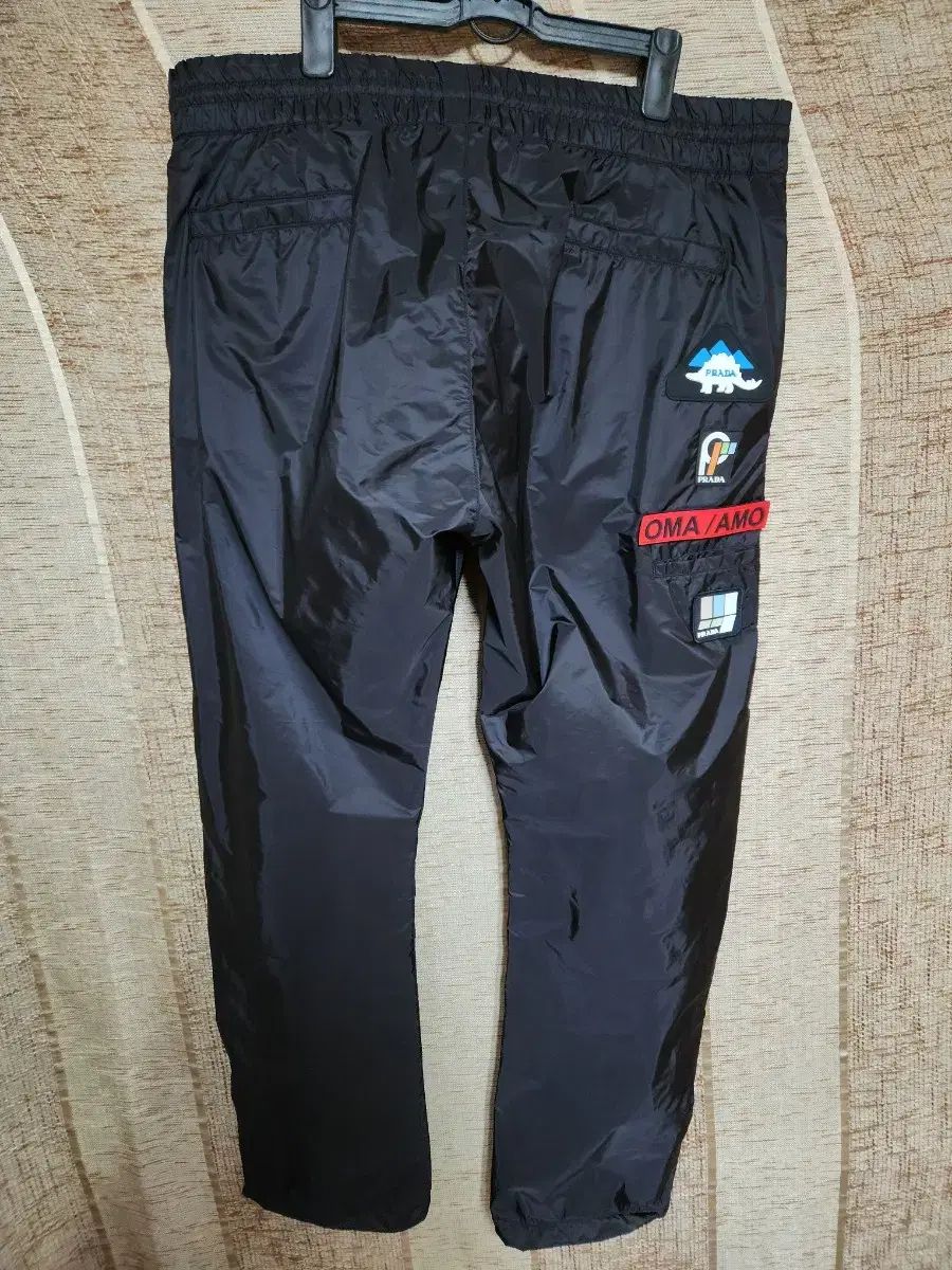 PRADA OMA/AMO ナイロン パンツ (XL 新品) 44,935円