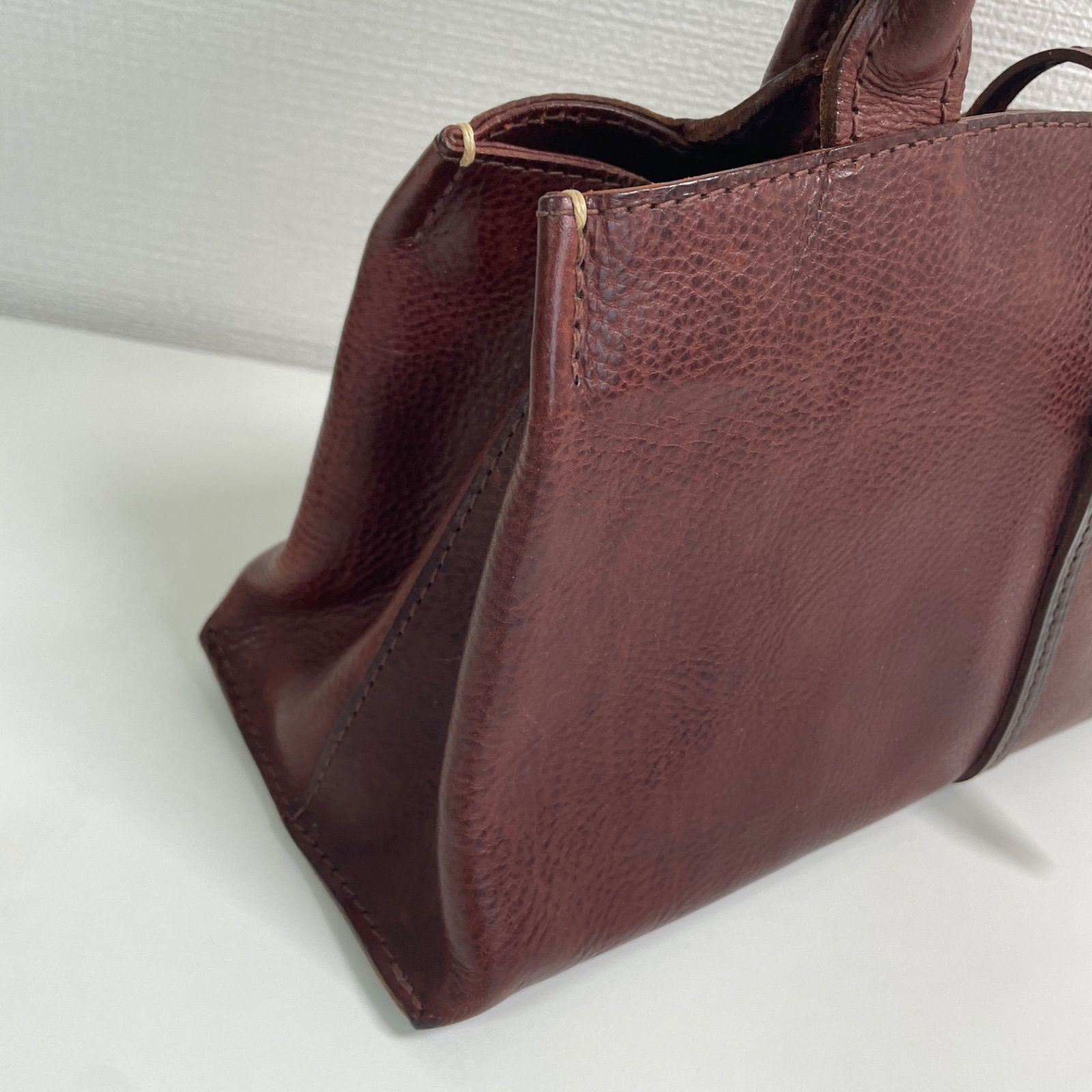 美品 genten ゲンテン レザー ハンドバッグ ダークブラウン - メルカリ