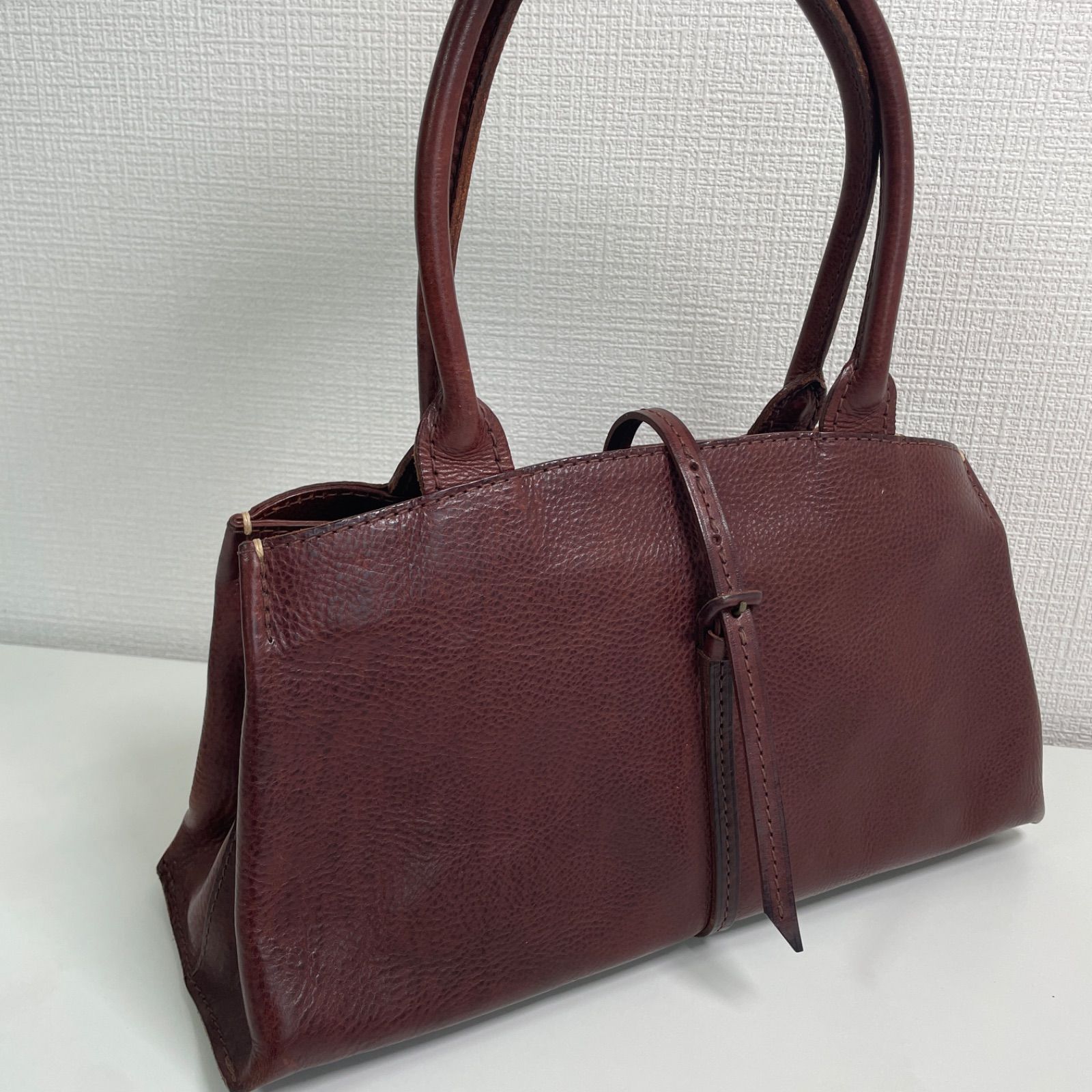 美品 genten ゲンテン レザー ハンドバッグ ダークブラウン - メルカリ