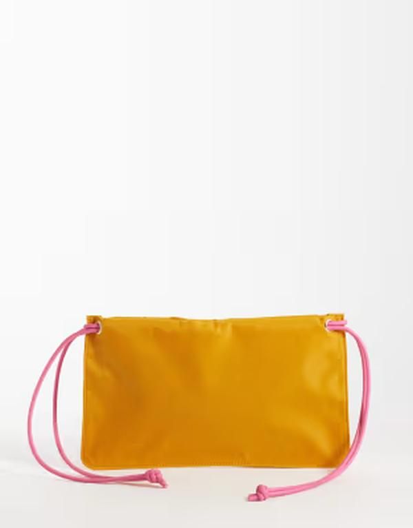 エイソス レディース バッグ ASOS DESIGN pouch clutch bag in orange オレンジ 8,736円