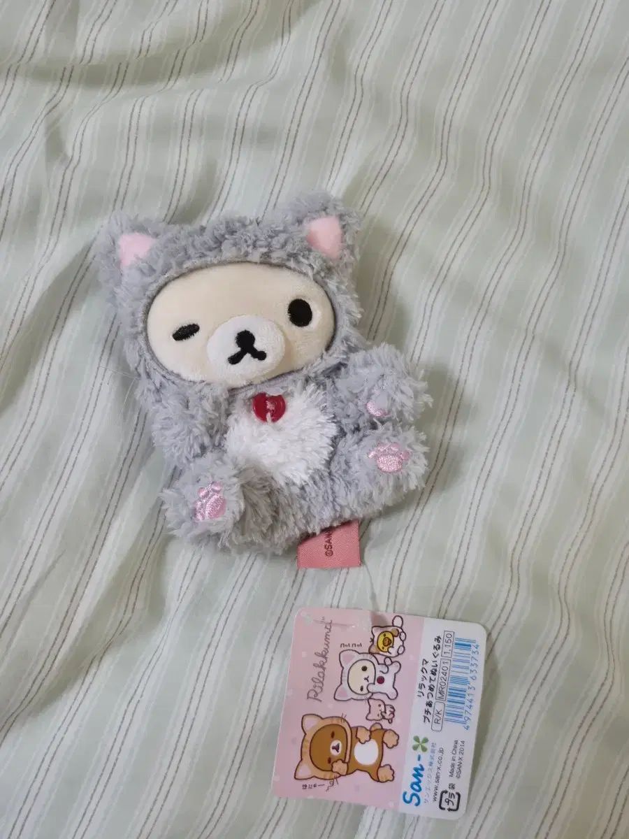 gato gato guiño korilakkuma peluche