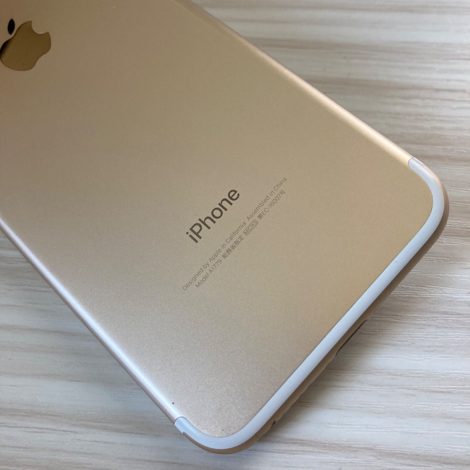 iPhone7 128GB GOLD SIMフリー(訳あり)- メルカリ