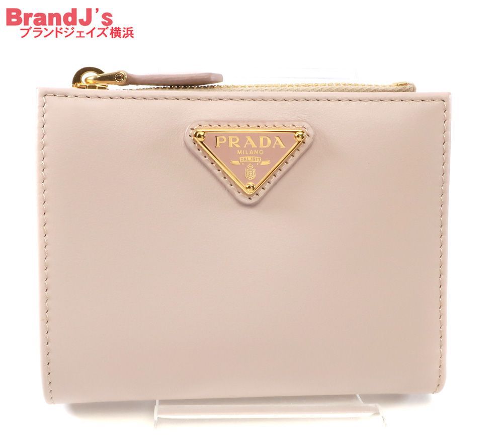 未使用 プラダ トライアングル コンパクト財布 シティカーフタブ 財布 レザー ピンクベージュ/パウダーピンク 1ML050 PRADA / 34919