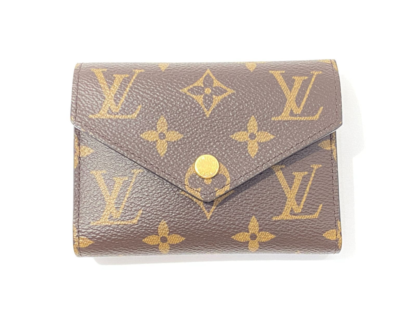 [七重浜85-1-080726nh] [併売]LOUIS VUITTON ルイヴィトン 三つ折り財布 ポルトフォイユヴィクトリーヌ　M62472[中古] [レディース] 98,000円