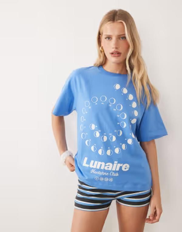 エイソス レディース トップス Tシャツ グラフィック ASOS DESIGN short sleeve oversized Tshirt with lunaire graphic in cobalt 10,765円