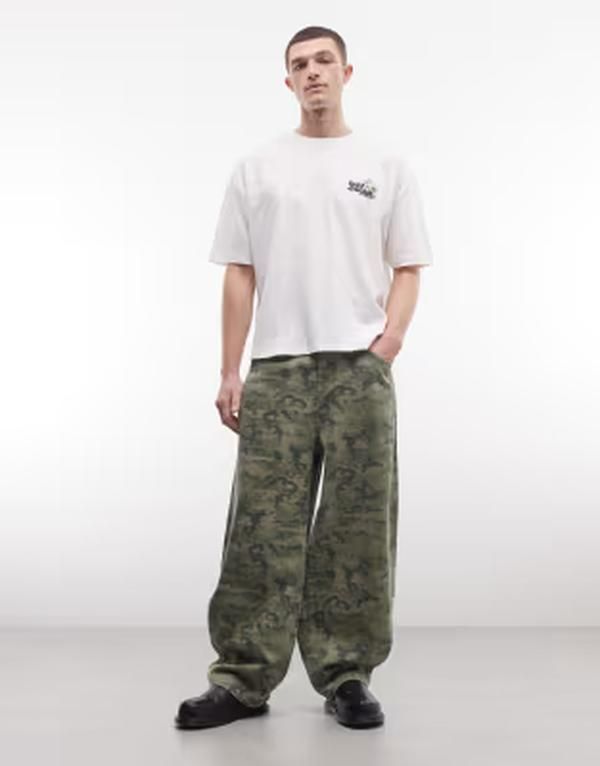 リクレイム ヴィンテージ メンズ ボトムス デニムパンツ ワイドレッグ プリント ジーンズ Reclaimed Vintage wide leg baggy jeans in camo print C 16,546円