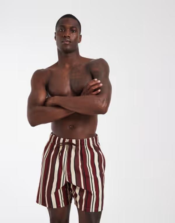 エイソス メンズ 水着 ハーフパンツ・ショーツ ショートパンツ ASOS DESIGN swim shorts in mid length in bold burgundy stripe Burgun