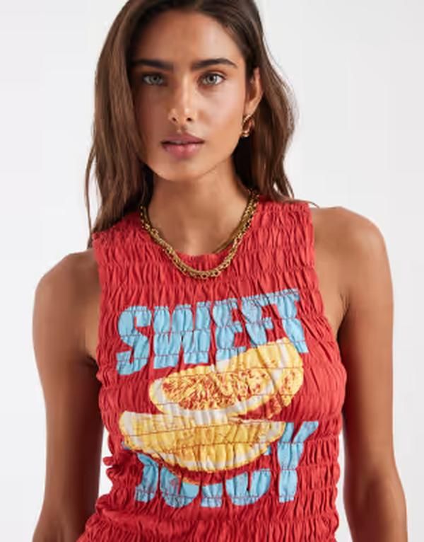 エイソス レディース トップス ベスト グラフィック ASOS DESIGN shir red tank top with orange fruit graphic RED レッド 8,861円