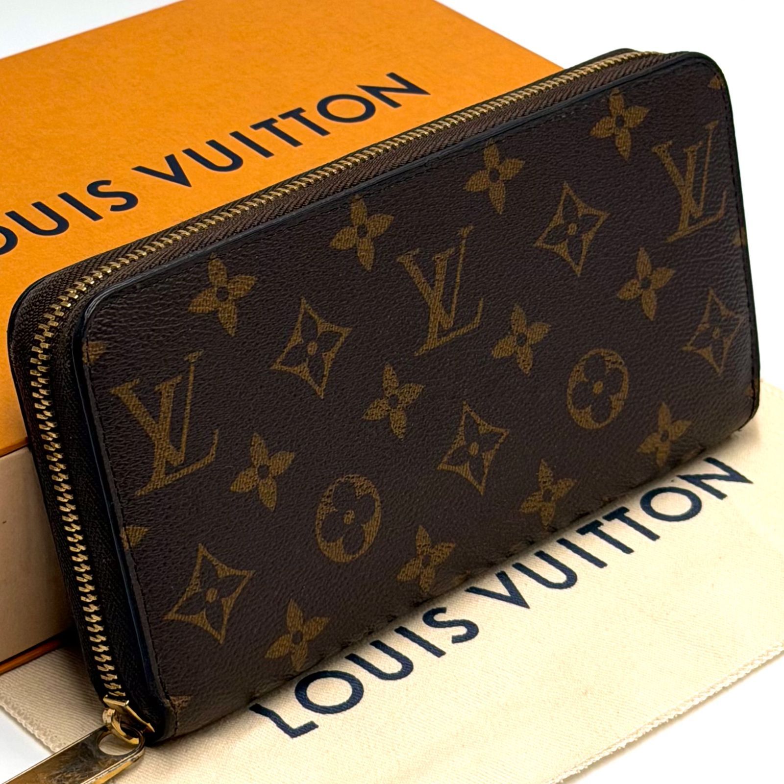ルイヴィトン LOUIS VUITTON モノグラム ジッピーウォレット コクリコ 新型 NM 長財布 ラウンドファスナー お札入れ 男女兼用 ブラウン レッド レザー