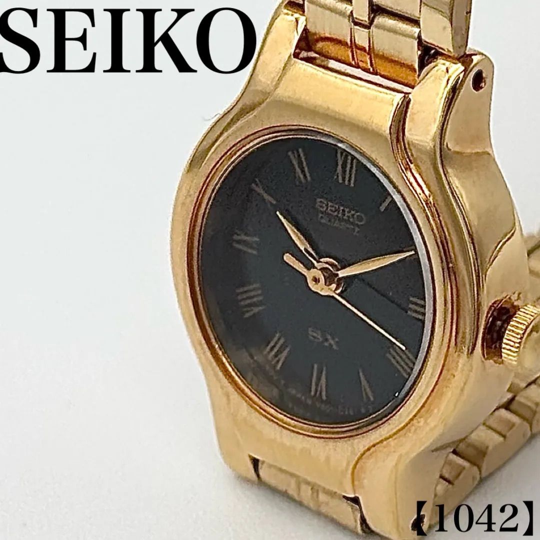 稼働品 Working item セイコー SEIKO 腕時計 レディース Ladies クォーツ Quartz V401-0091 SX ドレスウォッチ ゴールドカラー ローマ数字 黒文字盤 ラウンドフェイス アナログ 1042