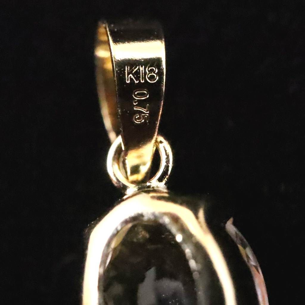 ロシア産 フェナカイト 6.7mm オーバルカット ペンダントトップ K18YG 鑑別書付 0.75ct 【榎本通商91762】