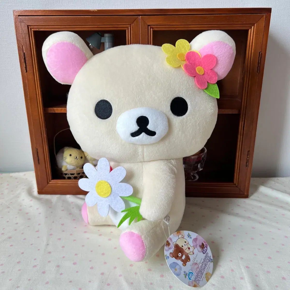 花を持つコリラックマぬいぐるみ
