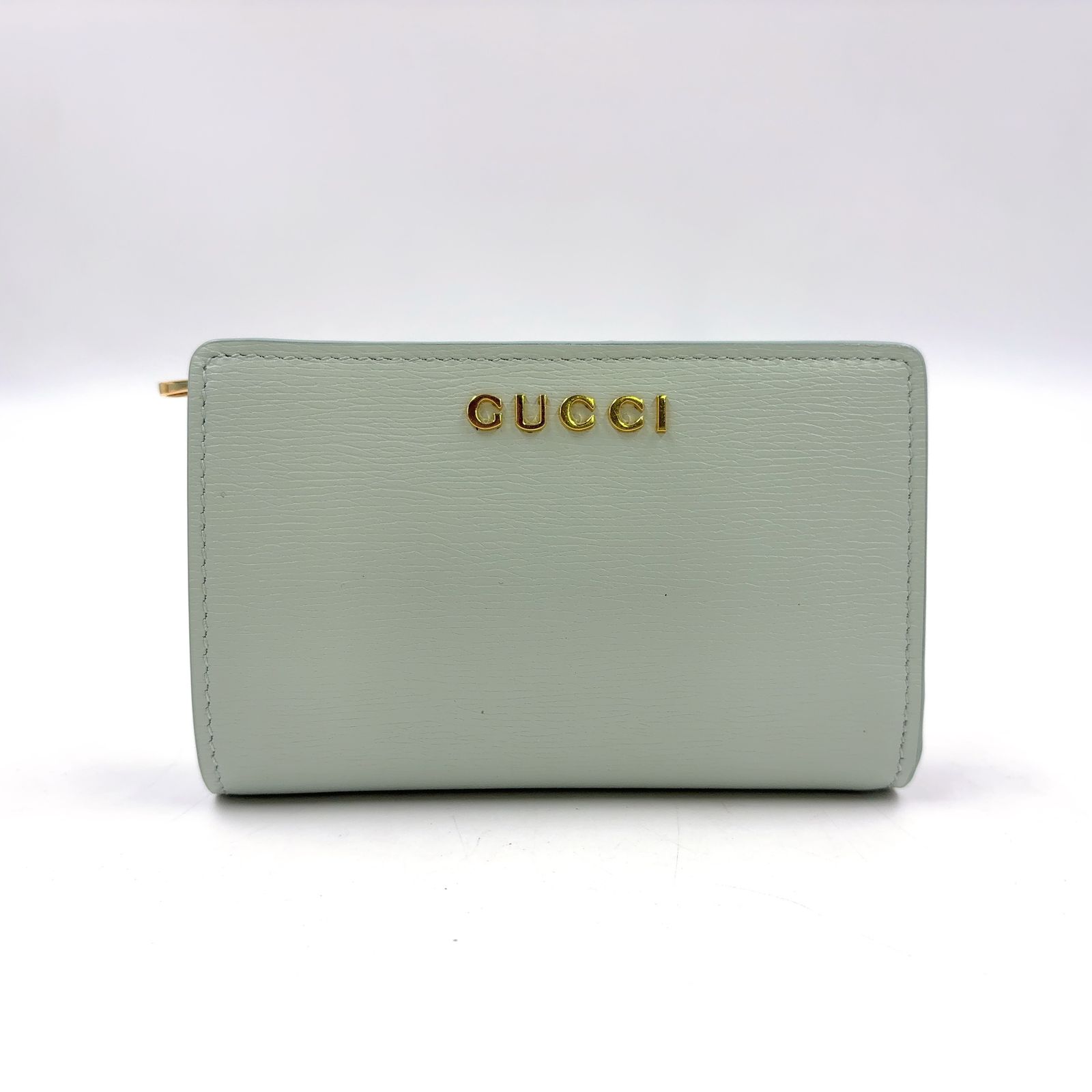 【新着】GUCCI スクリプト レザー ライトグリーン 二つ折り財布 ゴールド 772640